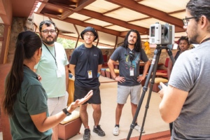 students learning to use a laser scanner