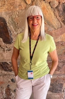 volunteer standing in hall way