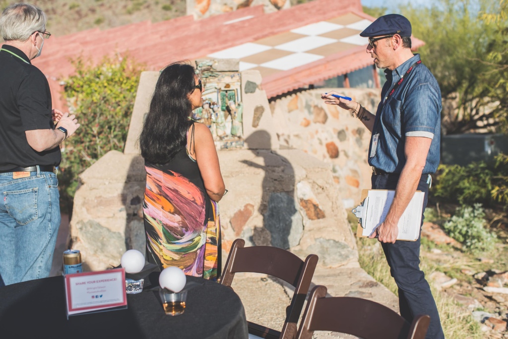 A volunteer at Taliesin West surveys visitors.